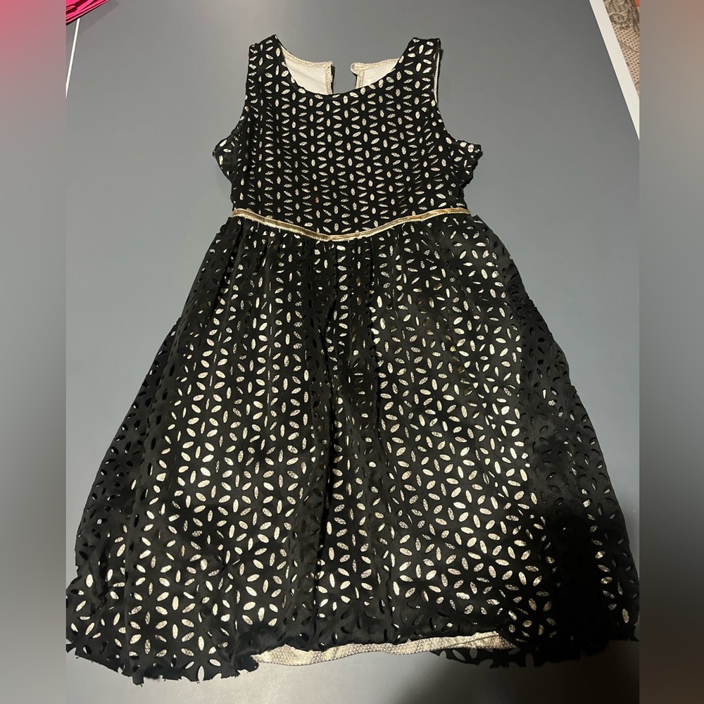 Gold and black dress. Beautiful for any occasion. Size 4t.